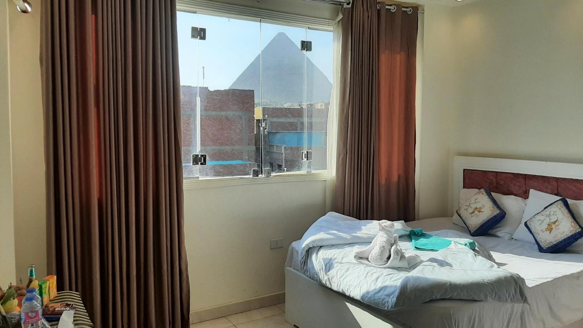 Queen Isis Pyramids View Al Kawm al Akhdar Bagian luar foto